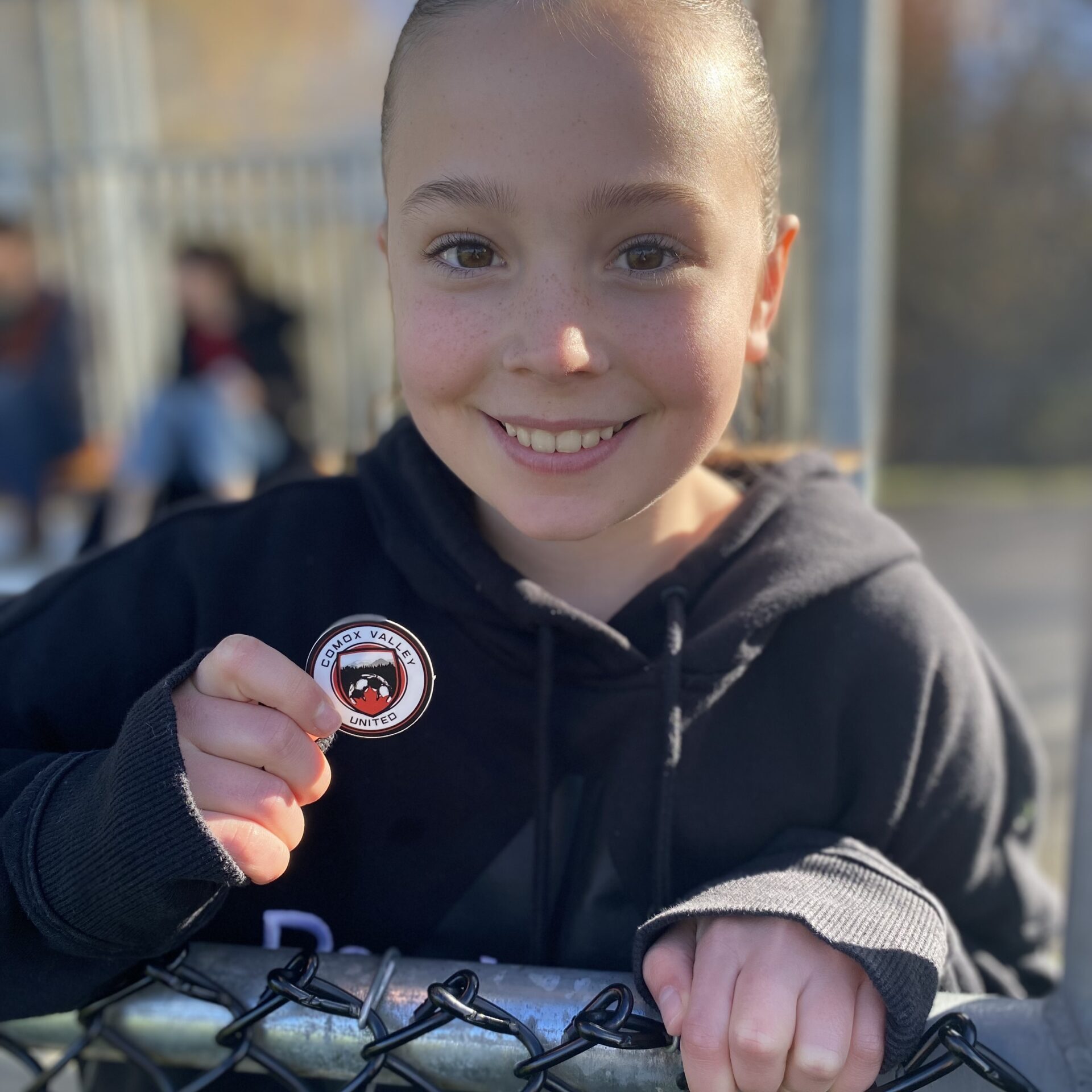 Girl Smiling with Sticker 2026